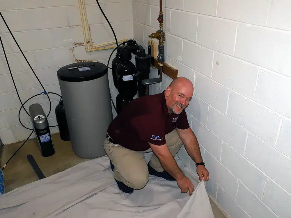 Jim installing water filtration system in Warrenton, VA.