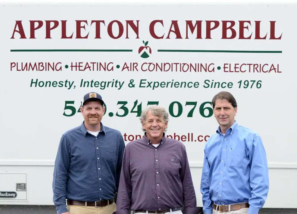 Michael, Mike, and Scott in front of Appleton logo van in Warrenton, VA