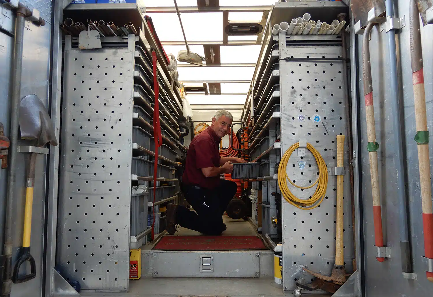 Appleton Campbell plumber inside of service truck in Warrenton, VA.